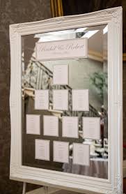 Large White Vintage Mirror Table Plan Image By Mike Garrard Classic White Wedding At Hedsor Seating Chart Wedding Wedding Table Plan Seating Plan Wedding