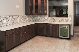 Wet Bar With Tan Luxury Vinyl Tile Flooring And A Tan And Brown Diamond Tile Backsplash Luxury Vinyl Tile Flooring Luxury Vinyl Tile Diamond Tile Backsplash