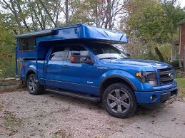 They fit inside the box of the truck with ease making them great for spontaneous camping trips. Ford F150 Eco Bust Custom Camper Slide In Truck Campers Truck Camping Truck Bed Camper