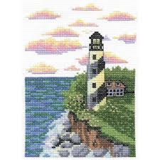 This coastline sentinel stands against a breathtaking morning sky. Winter Lighthouse Cross Stitch Pattern Lighthouse In The Snow Cross Stitch Pattern Winter Sea Cross Stitch Snow Landscape Cross Stitch Sewing Fiber Craft Supplies Tools Beyourbussiness Com