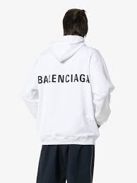 Spanish haute couturier cristòbal balenciaga's innovative designs, known for their sculptural volumes and strict modernity, cemented his reputation as one of the 20th. Shop White Balenciaga Logo Print Oversized Hooded Jumper With Express Delivery Farfetch