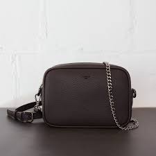 Channeling the resourceful intelligence of grace murray hopper, the grace crossbody is named after a woman who served as a rear admiral in the us navy and changed the face of coding forever. Grace Mini Crossbody Signet Dark Brown