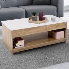 Rondes ou rectangulaires pour les plus classiques, géométriques pour une touche design, en bois, en verre ou métal, nos tables basses s'adaptent à chaque espace de vie. Table Basse Plateau Relevable Imitation Hetre Plateau Blanc Soa Id Market