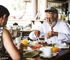 download premium image of couple eating a hotel breakfast 424653 hotel breakfast breakfast photo luxury hotel