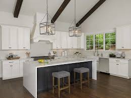 Tuxedo kitchen farmhouse kitchen, charlotte this bright and beautiful modern farmhouse kitchen incorporates a beautiful custom made wood hood with white upper cabinets and a dramatic black base cabinet from kraftmaid. Tuxedo Cabinets Are All The Rage In New Kitchens For Good Reason