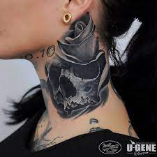 A beautiful piece of skull tattoo design on arm. Grey Skull Rose Neck Tattoo U Gene Best Neck Tattoos Rose Neck Tattoo Side Neck Tattoo