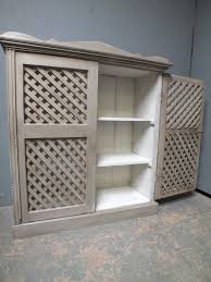 antique pine cupboard with lattice work
