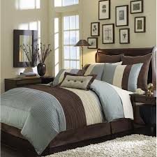 This stylish, sophisticated comforter set features a silver floral pattern on a black ground with shiny gold accents. Masculine Comforter Set Ideas On Foter
