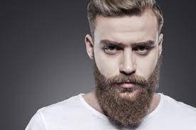 Man attractive well groomed facial hair. 4 Beard Grooming Tips