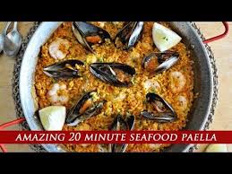 How To Make The Most Amazing 20 Minute Seafood Paella This Recipe Is Loaded With Spanish Flavor Super Easy To Make In 2020 Paella Recipe Paella Paella Recipe Seafood