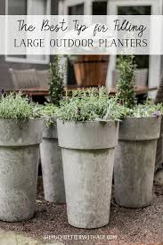 Tusco products ctr32bk cosmopolitan round garden planter, black. The Best Tip For Filling Large Outdoor Planters So Much Better With Age