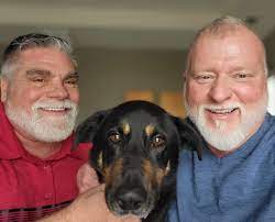 Dog abandoned for being 'gay' is adopted by same