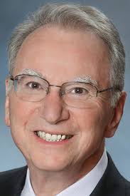 Nancy Worlie cleans house at KPBS