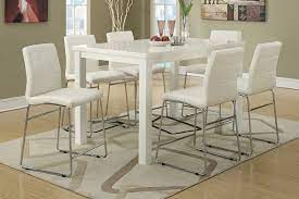 Modern counter height dining tables also are great for creating a more relaxed and causal environment. Long White Modern Table Counter Height Google Search Counter Height Dining Table Set Counter Height Dining Table Bar Height Dining Table