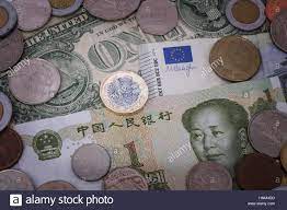 New Pound Coin Against Background Of Currencies Includind Yuan Dollar And Euro Stock Photo Coins Stock Photos Currency