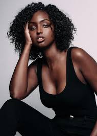 The Off White Background And Black Clothes Give The Model An Extra Strength Dark Skin Beauty Beautiful Dark Skin Dark Skin Women
