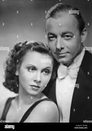 Heinz Ruehmann as Axel Roth and Hertha Feiler as Ursula Roth in the feature  film "Happiness Is the Main Thing" (Hauptsache gluecklich), directed by  Theo Lingen Stock Photo