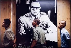 Acepto que no fue coyoles en miel el autor intelectual del crimen. Recruits Pass By Official State Portrait Of Anastasio Somoza Debayle As President And Commander In Chief Of The Armed Forces Nicaragua International Center Of Photography