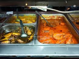 Dig in to a delicious banana leaf curry meal. Samy S Curry Good Affordable Indian Restaurant At Dempsey The Ordinary Patrons