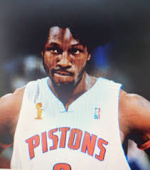 Los Angeles Lakers' Shaquille O'Neal puts up a shot in front of Detroit  Pistons Jerry Stackhouse (front) and Ben Wallace during the first quarter  at the Palace of Auburn Hills,