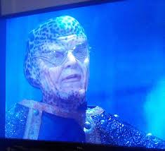 The Torturer of two races. Same actor, notice the glasses