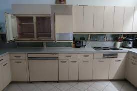 Cover up your unused space with metal wall cabinets for additional the modern style differs from the previous ones with its clean, streamlined. This Time Capsule Ge Steel Kitchen Has Almost Everything Ge Kitchens Were Famous For Retro Renovation