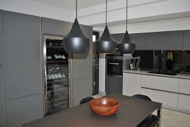 Countertops, faucets, sinks, toilets, cabinets, saunas, hot tubs This Slick Modern Kitchen Has Been Designed Mainly In Dark Grey With Contrasting Light Base Units The Dark Grey Handless Modern Kitchen White Worktop Kitchen