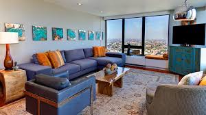 Get it as soon as tue, jul 13. 15 Stunning Living Room Designs With Brown Blue And Orange Accents Home Design Lover