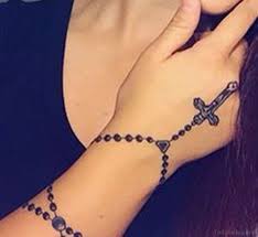 Jun 08, 2019 · the tattoo of these rosary beads and the cross on the wrist makes it appear as if this person is really wearing this accessory! 30 Cool Rosary Tattoos On Hand
