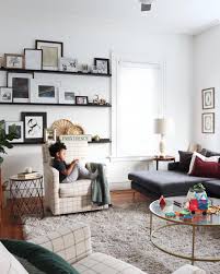 Satisfying Solutions For Decorating A Large Blank Wall Made By Carli Family Room Walls Large Wall Decor Large Wall Shelves