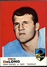 Manu Tuiasosopo helping an unidentifiable 49er teammate try to bring down  the Falcons Sylvester Stamps. #91 is Larry Roberts & #55 is Wayne Radloff.