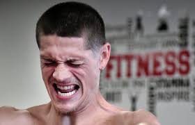 Trainer Anthony Comer helps stabbing survivor Corey Andrade recover