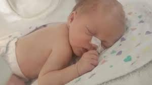 Bridget Flanagan and Damien Jackson await baby Hazel's second surgery