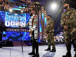 Apollo crews' new attire consisted of a scarf and new white and green color on his gear. Apollo Crews Nigerian Accent Sure Has People Talking Cageside Seats