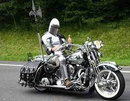 You Might Be Cool But Are You Full Suit Of Armor On A Fully Chromed Harley Cool Motorcycle Harley Knight In Shining Armor Knight Rider