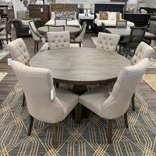 A bold chevron pattern wood top and curved solid acacia base will make this 7 piece extension dining table set your new favorite for all of life's moments. Sardis 60 Round Dining Table Distressed Natural Classic Carolina Home