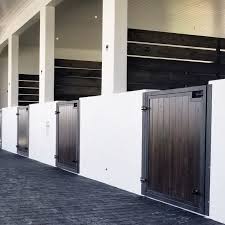 These Custom Stall Doors Featuring A Vertical Wood Bottom Are Fresher Than The Mint On Your Pillow Drea Dream Barn Stables Barn Stalls Dream Horse Barns