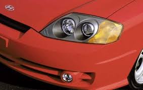 Image result for Sunny Yellow 2004 Tiburon