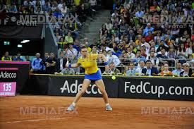 In primul meci al zilei, simona a trecut, cu ceva. Tenis Fed Cup Romania Elvetia Halep Golubic