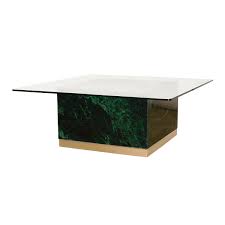 The simple open cross brace design articulates refinement and elegance echoed by the luxury of black marble. Quebec Coffee Table Green Marble Ruth Joanna