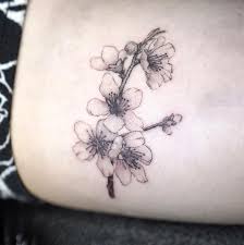 Black And White Cherry Blossom Shoulder Tattoo Full Of Lightness Black And Gray Cherry Blossom Flowers Tattoo Idea Cherry Blossom Tattoo Cherry Blossom Tattoo Shoulder Tattoos For Women Flowers