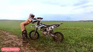 Naked woman riding a Dirt Bike - XVIDEOS.COM