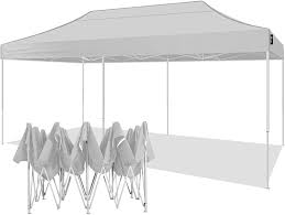 With a popup frame for easy transportation and a canopy top offering uv protection, heat reduction, and water and wind resistance, it is perfect for outdoor occasions such as camping trips. Amazon Com American Phoenix Canopy Tent 10x20 Pop Up Instant Shelter Shade Heavy Duty Commercial Outdoor Party Tent 10x20ft White Frame White 1 Patio Lawn Garden