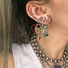 14 Small Tattoo Ideas Vivaglee Ear Piercings Flame Tattoos Piercings