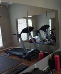 If you have a bathroom and kitchen in the basement, you can even turn the entire space into a workout suite. 59 99 Per Mirror Install Please For My Gym Row Of Mirrors From Home Depot Used In A Home Gym Home Gym Mirrors Home Gym Decor Gym Mirrors