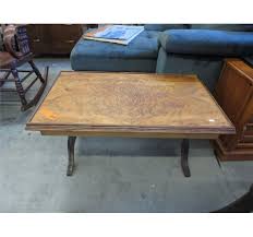 I have a duncan phyfe dark mahogany drop leaf table. Vintage Duncan Phyfe Coffee Table
