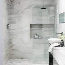 Marble floors are the ideal touch of beauty and sophistication for any bathroom. These Faux Marble Tiles Have Got Everyone Talking