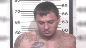 Warrant: 'White supremacist' accused of choking child in Henry County