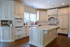 Kitchen cabinet door hinges are typically mounted on the outside. Kitchen Remodeling Tuscan Custom Cabinets Ackley Cabinet Llc