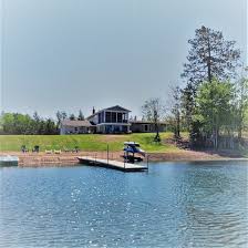 Exclusive Retreat! Private Lake, River Frontage and 100's of Acres with  Trails